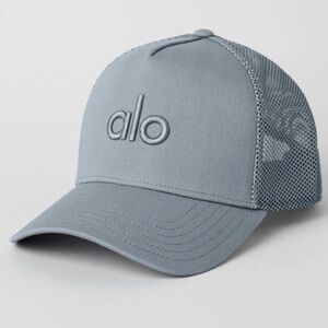 Alo District Trucker Hat in Stingray